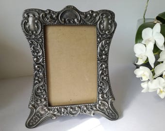 Heavy cast picture frame ,nice condition, not very old i think 1970's