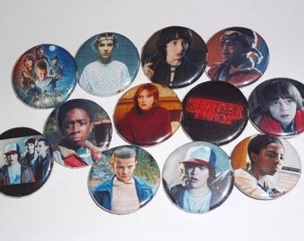 Stranger Things Cast and Logo Button Sets, Millie Bobby Brown as Eleven, Gaten Matarazzo as Dustin, Winona Ryder as Joyce, and more