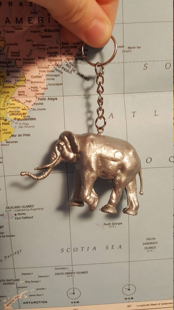 Items similar to Silver Painted Plastic Animal Figure Elephant Keychain