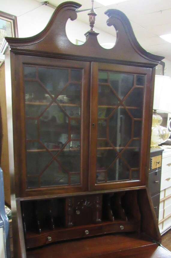 Mahogany secretary bookcase with serpentine drawers & secret compartments