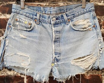 90s Distressed Levis Cutoff Shorts. 1990s High Waist Denim Jean Shorts, Heart & Floral Embroidery Patches. Levi 501's Button Fly. 32" Waist