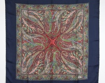 Liberty of London scarf in multicolored paisley with Navy border. Hand rolled hem 27" square. Classic!!