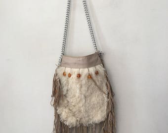 New fur stylish bag , size medium .
