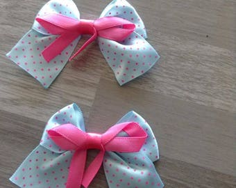5 flower applique blue satin bow has pink polka dots