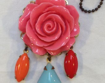 C1950s brass and plastic pink rose pendant with blue and red drops with chain