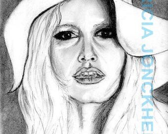 Portrait of Brigitte Bardot with white hat