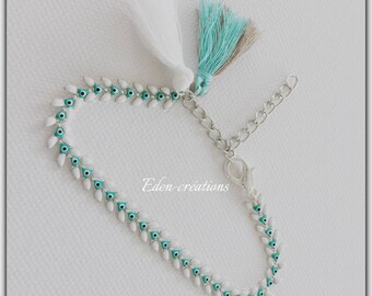 Turquoise and white spike bracelet, tassel