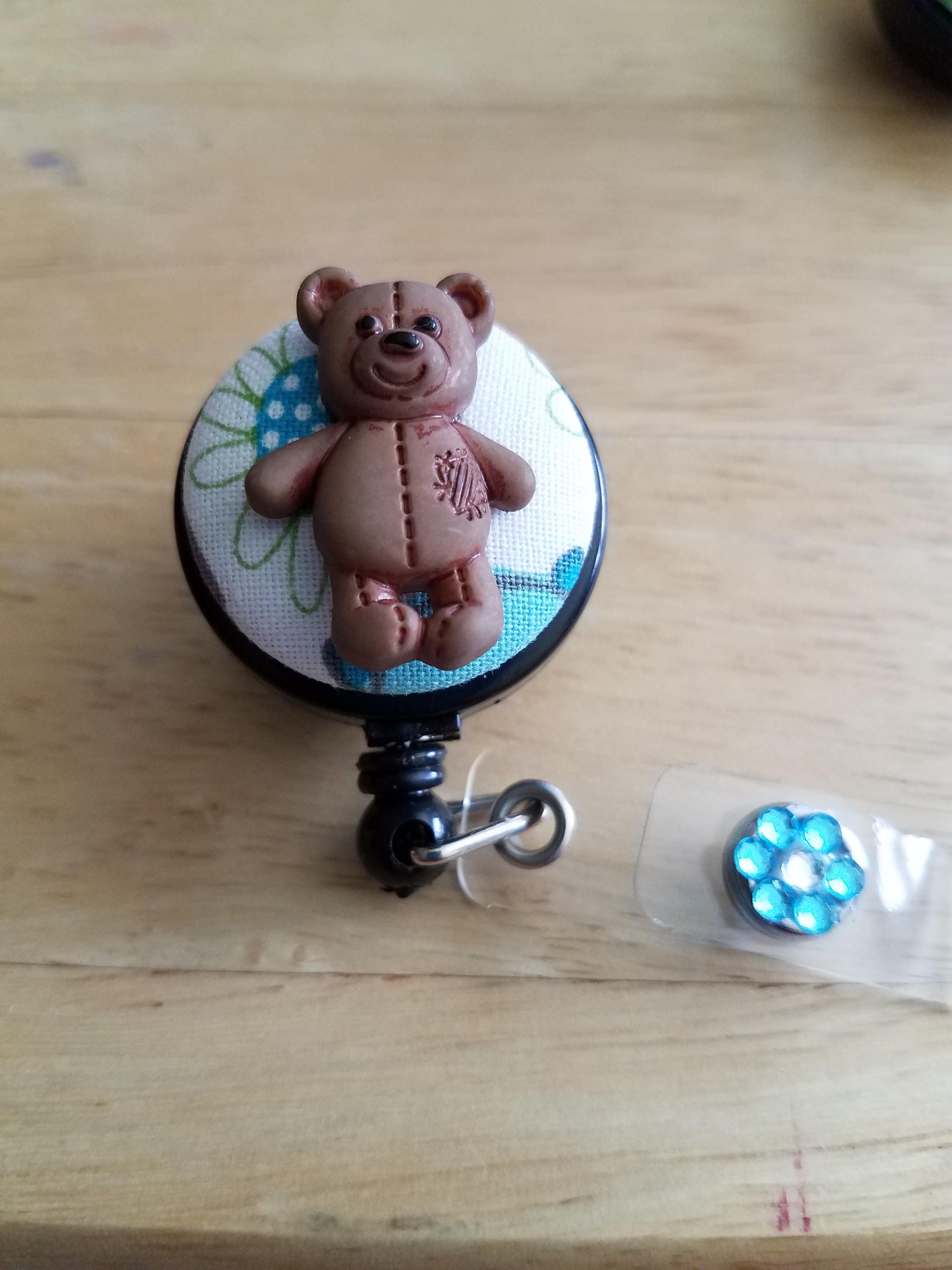 the teddy bear badge