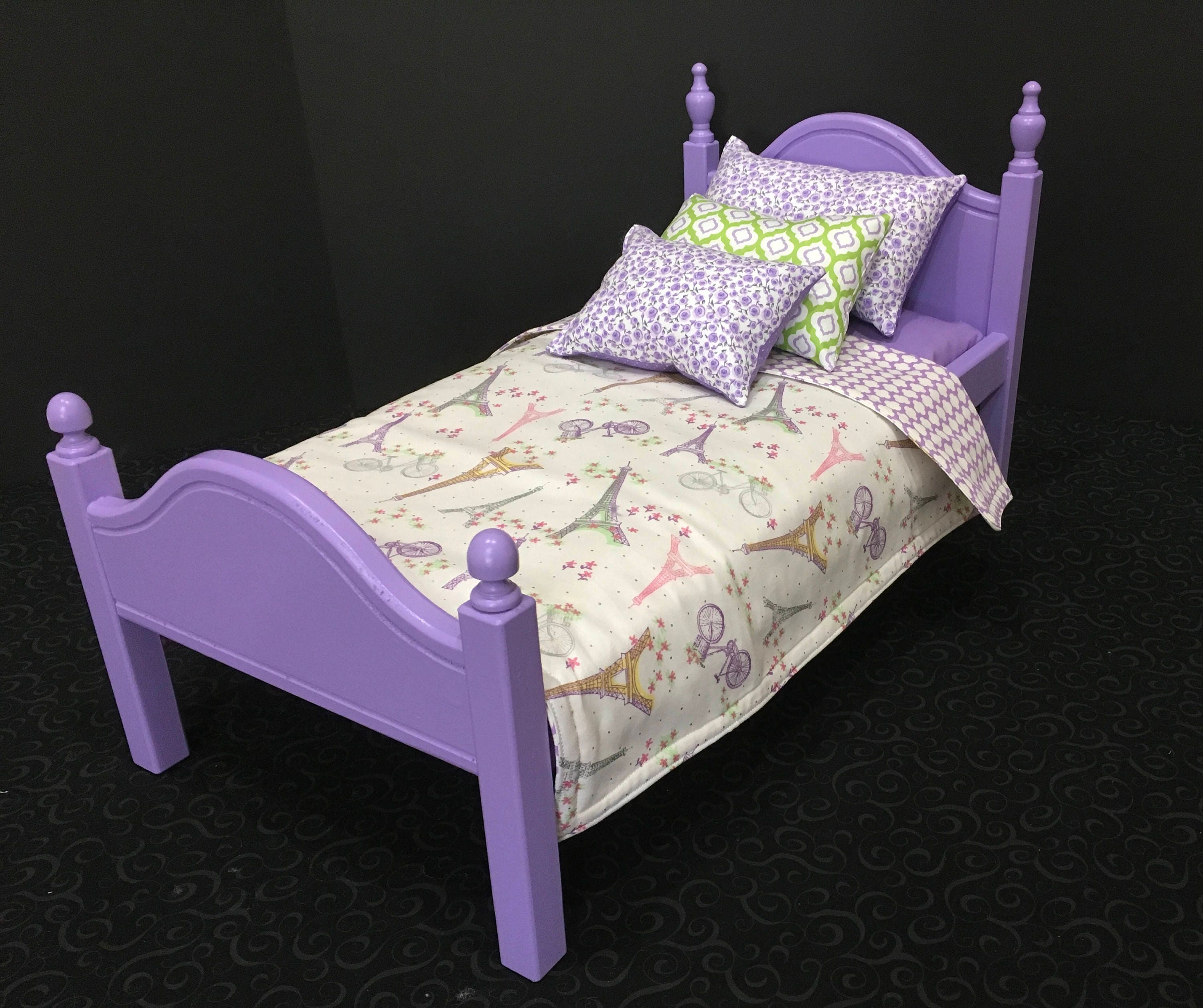 American Girl Doll bed with lavender and white Paris bedding.