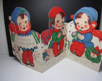 Adorable 1940's-50's die cut Rust Craft juvenile christmas card for a fine boy 3 panels of boys playing instruments, Marjorie Cooper?