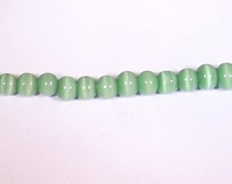 20 dark green cat's eye glass 4mm