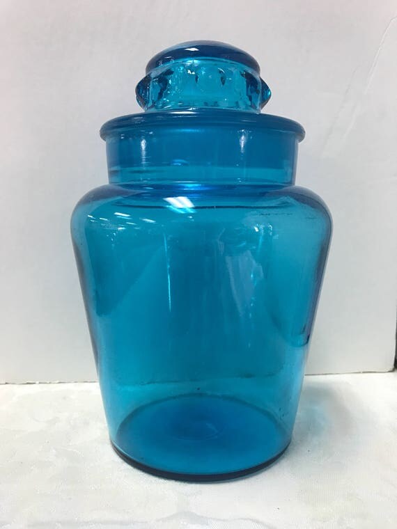 Blue apothecary jar with lid