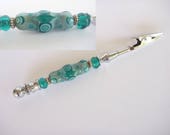 Bracelet Helper featuring...