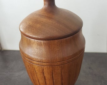 For example, tea in craft jar to store, wood turning, one of a kind