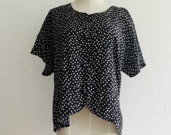 white and black polka dot top