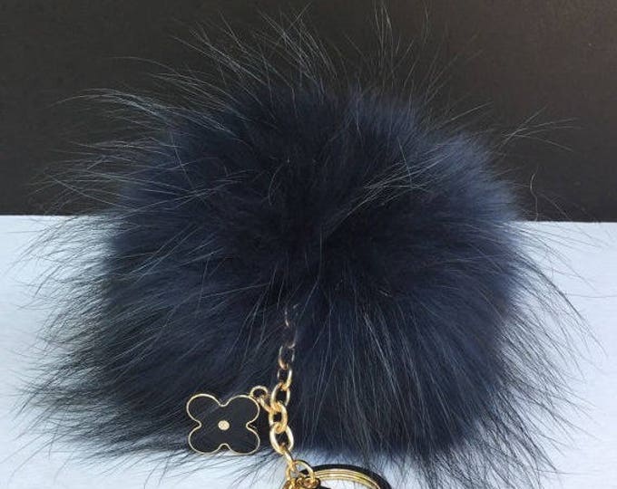 Dark blue with natural markings Raccoon Fur Pom Pom luxury bag pendant + black flower clover charm keychain