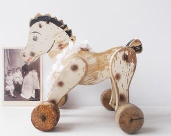 Ancien jouet bois animé à pousser animal double chevaux