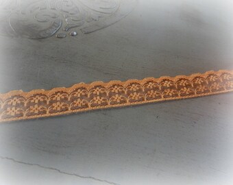 orange color lace - 100 cm long and 2 cm wide