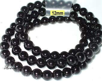 1 strand 82cm = 72 glass beads 12 mm black (812.02.1)