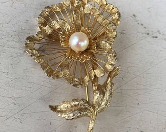Brooks gold tone flower pin with faux pearl