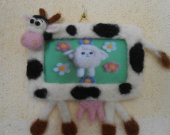 Cadre photo vache en laine feutrée.