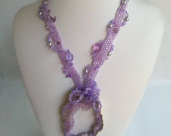 Freeform necklace crafted with crystals,pearls and beads.