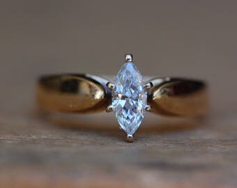 Vintage 18K marquise diamond solitaire engagement ring ・ .37 carat total weight, D / VS2