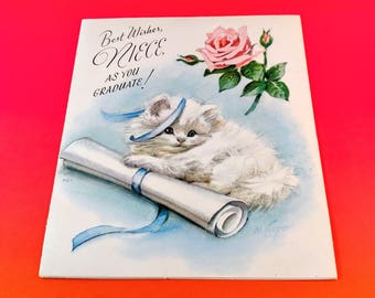 1950's Marjorie Cooper Graduation Card. "Best Wishes Niece as You Graduate" with White Kitten and Pink Rose. Mid Century Ephemera.