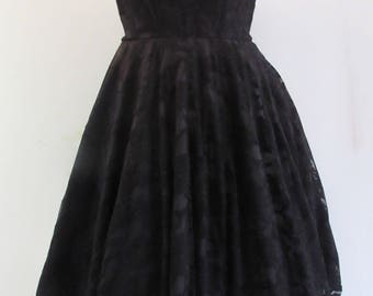 Short black lace dress with sweetheart neckline
