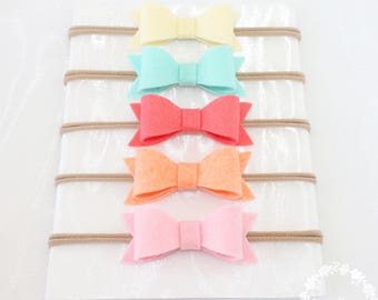 Baby Headbands. Baby Headband. Bows. Nylon Headband. Newborn Headband. Infant Headband. Baby Headband Set. Baby Bows. Bow Headband. Nylon