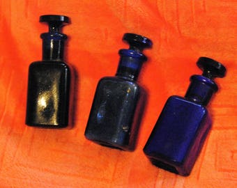 Three Antique Cobalt Medicine Bottles