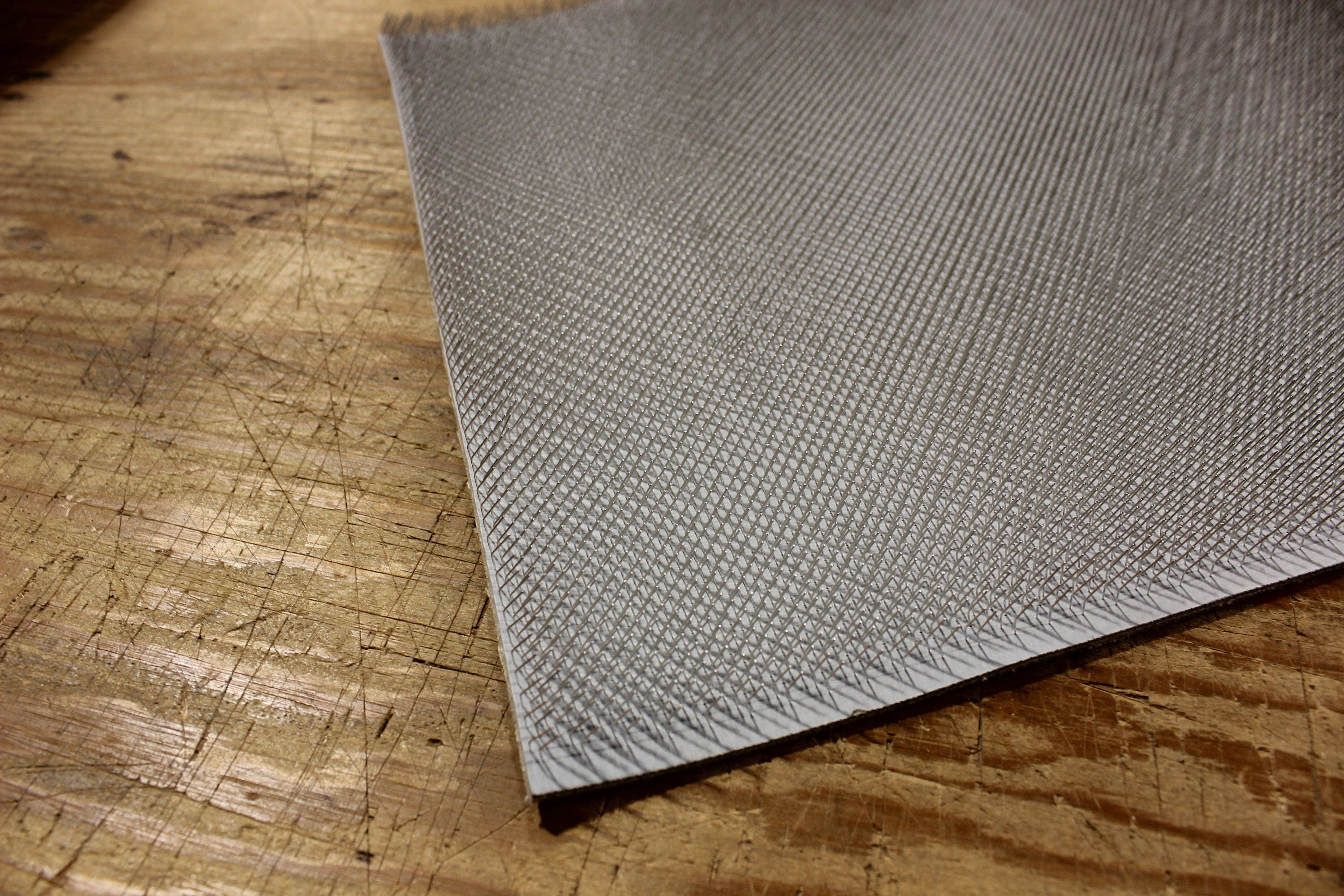 90 TPI carding cloth 12" overall wide, x 23 3/4" long on wire.FACTORY