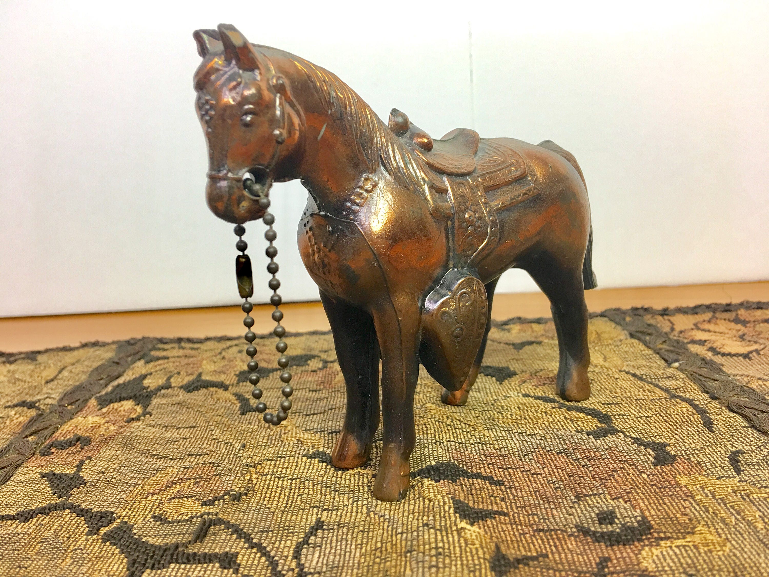 old metal horse figurines