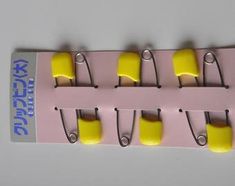 Safety pin in metal with safety Cap