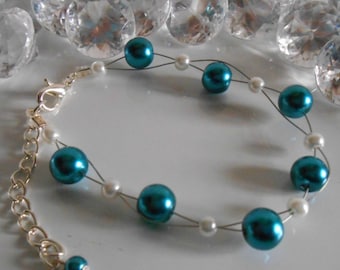 Wedding bracelet twist of peacock blue and white beads