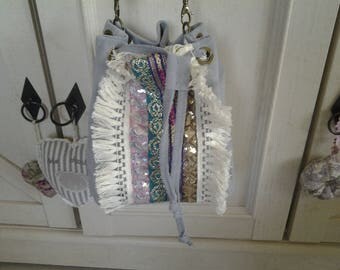 Light gray suede vintage designer bag.