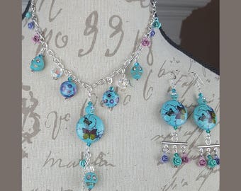 Skully Butterfly and Flower Garden necklace and earrings set.