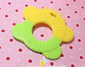 Green and yellow soft plush animal shape teething item
