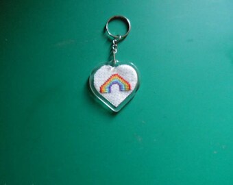 Heart shaped key chain with a rainbow