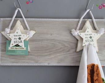 Wall decoration to hang towels or photos