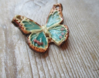 Rustic Browns Aqua and green Butterfly pendant pottery pendant