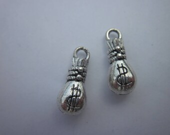 4 travel charms $ silvered (348)
