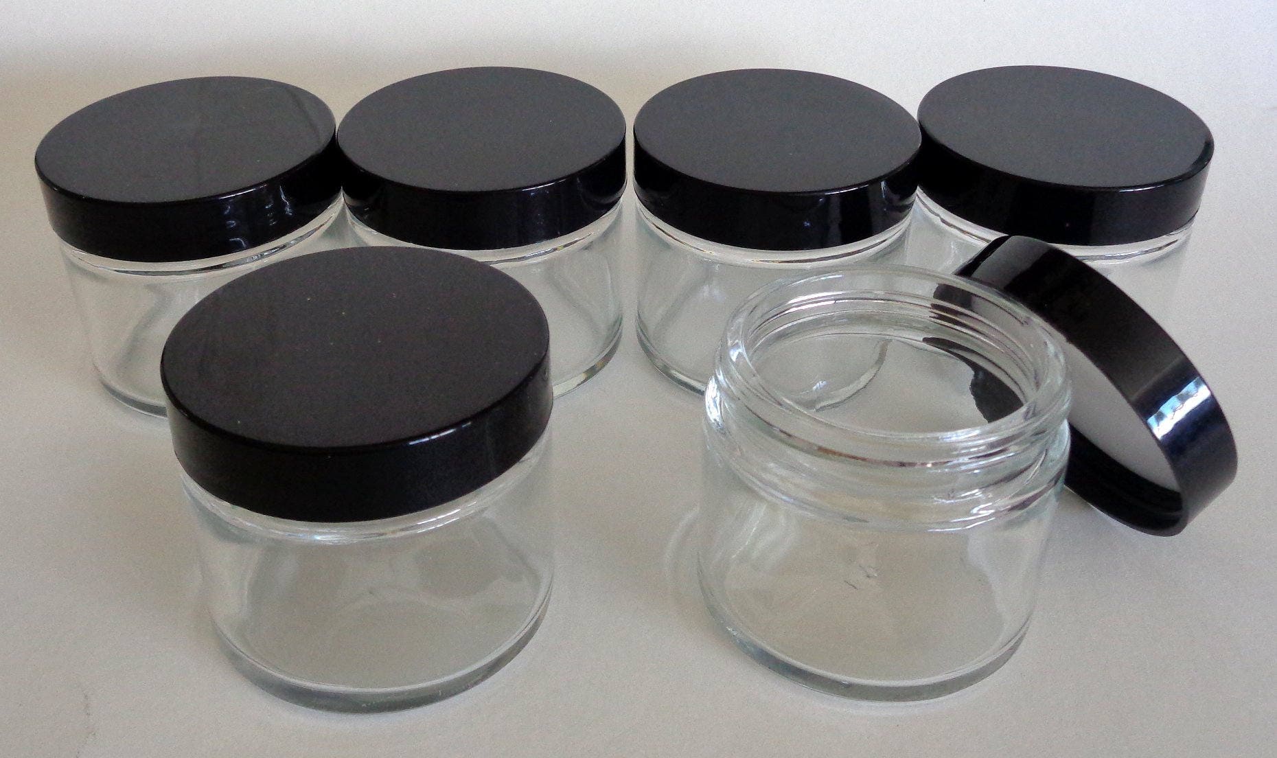Small Glass Jars 2oz Clear Glass Jars with foam lined caps