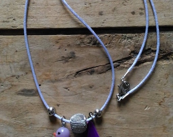Duck necklace mad with Pearl and purple feather