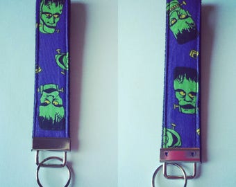 Green Frankenstein Monster on purple - Key Fob Wristlet