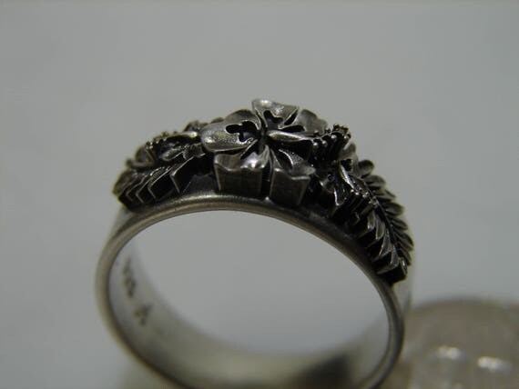 Floral ring. Zoom in on this ring to see the incredible detail. This Hibiscus ring features high detail in a stunning 3D design.