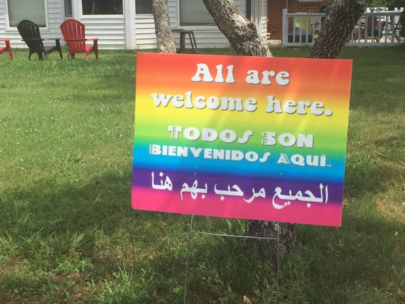 All Are Welcome Here yard sign