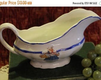 Christmas in July Sale Ceramic Gravy Boat with Dutch Woman Transfer and Blue Hand Painted Trim
