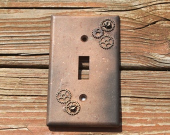 thumbnail image 2 of Industrial Switch Plate Steampunk Light Switch Cover - Rust Color With Gears & Pipes For Industrial Home Decor Industrial Steampunk Switch Plate Rust Color Gears 2 of 14