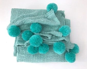 Turqousie Pom Pom blanket